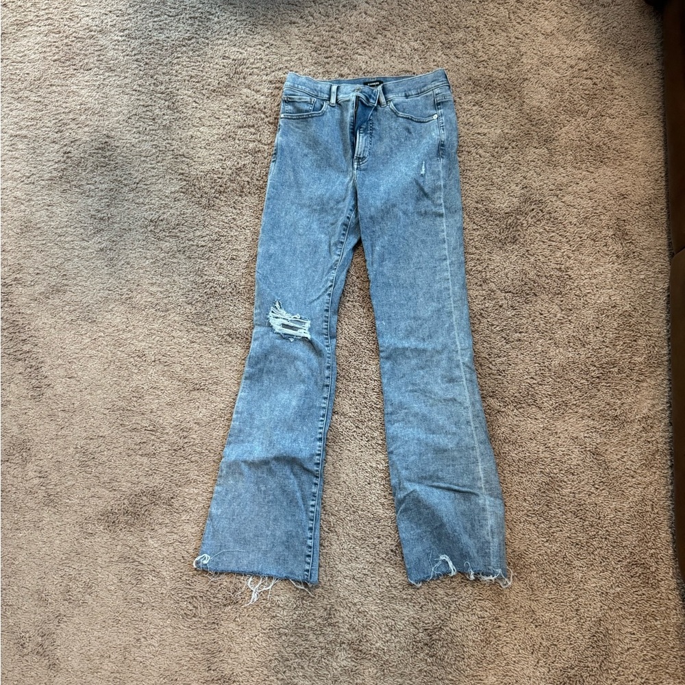 Acid wash distressed boot jeans